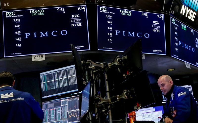 Ticker and trading information for Pacific Investment Management Co. (PIMCo) are displayed on a screen at the New York Stock Exchange (NYSE) in New York, U.S., April 5, 2018. REUTERS/Brendan McDermid/File Photo