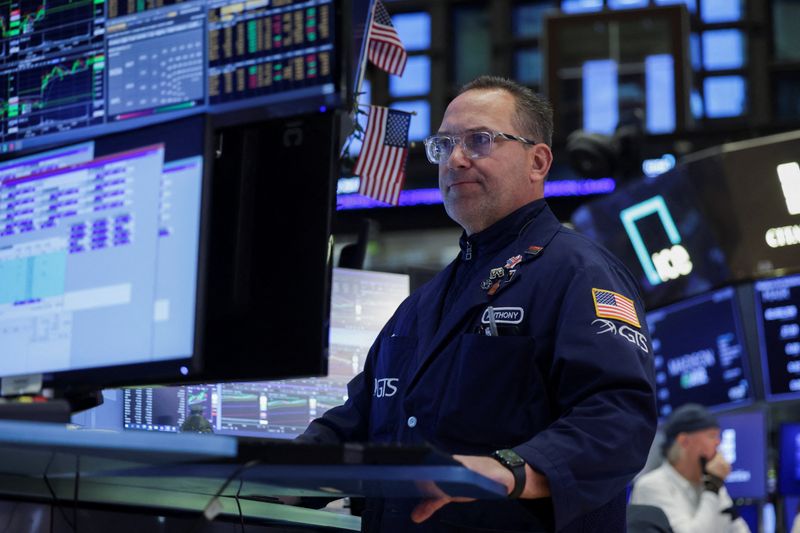 A trader works on the floor at the New York Stock Exchange (NYSE) in New York City, U.S., April 16, 2026. REUTERS/Jeenah Moon