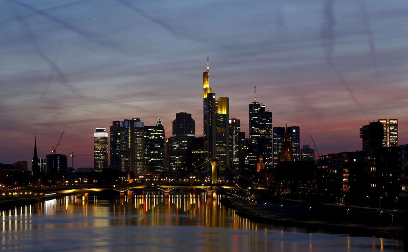 FILE PHOTO: The famous skyline with its banking district is pictured in Frankfurt early evening April 13, 2015. The European Central Bank's governing council will meet in Frankfurt on Wednesday, April 15.  REUTERS/Kai Pfaffenbach/File Photo