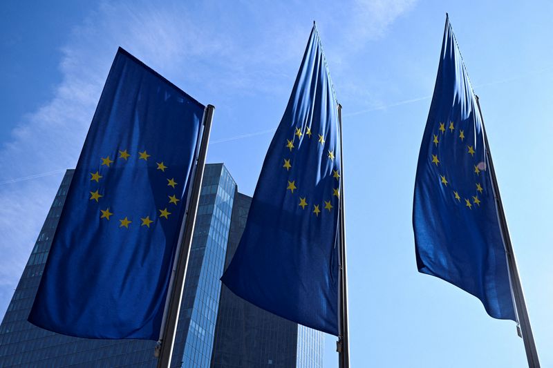FILE PHOTO: European Union flags flutter outside the European Central Bank (ECB) headquarters in Frankfurt, Germany, March 19, 2026. REUTERS/Jana Rodenbusch/File Photo