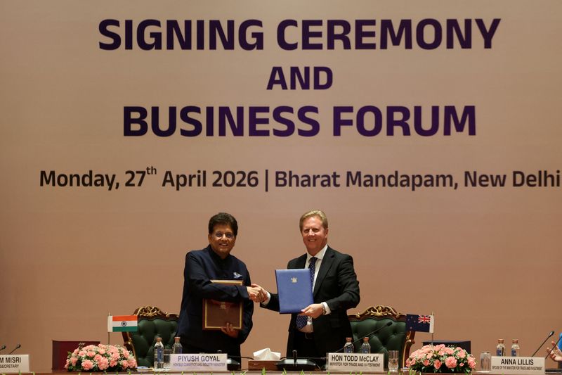 India's Commerce and Industry Minister Piyush Goyal and New Zealand's Trade and Investment Minister Todd McClay shake hands during the signing ceremony of the India-New Zealand Free Trade Agreement at Bharat Mandapam in New Delhi, India, April 27, 2026. REUTERS/Bhawika Chhabra