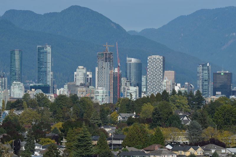 Condominium and office towers are seen on the mountain-backed skyline of Vancouver, British Columbia, Canada September 30, 2020. REUTERS/Jennifer Gauthier