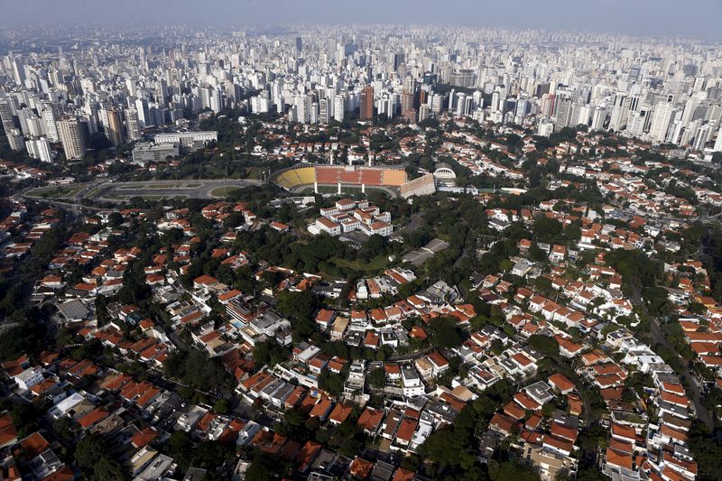 An aerial view of Pacaembu neighborhood is seen with the skyline of Sao Paulo April 12, 2015. REUTERS/Paulo Whitaker