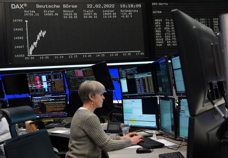 A trader works at the Frankfurt stock exchange in Frankfurt, Germany, February 22, 2022.    REUTERS/Timm Reichert