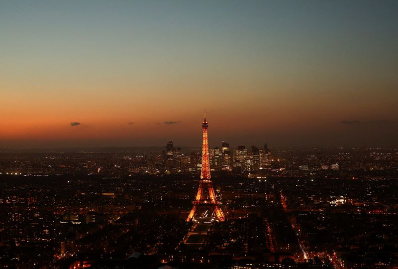 The Eiffel Tower and the Paris skyline at sunset as seen from the Montparnasse Tower in Paris, France, March 11, 2026. REUTERS/Abdul Saboor