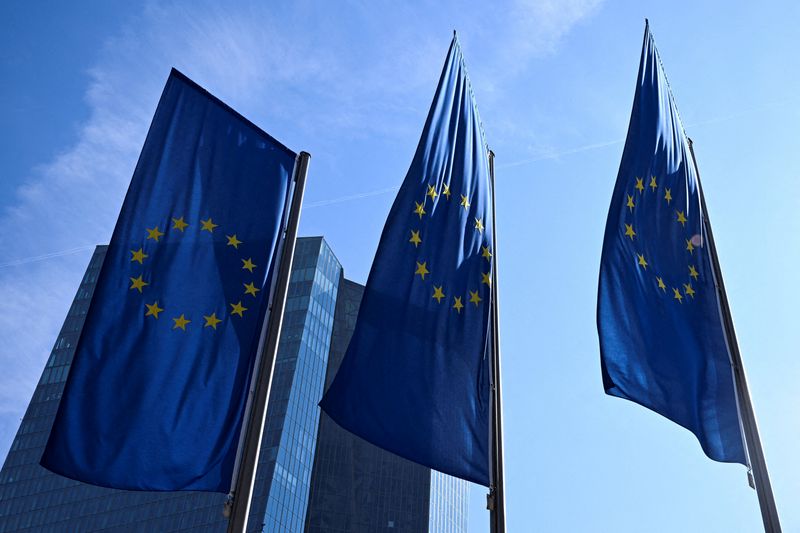 FILE PHOTO: European Union flags flutter outside the European Central Bank (ECB) headquarters in Frankfurt, Germany, March 19, 2026. REUTERS/Jana Rodenbusch/File Photo
