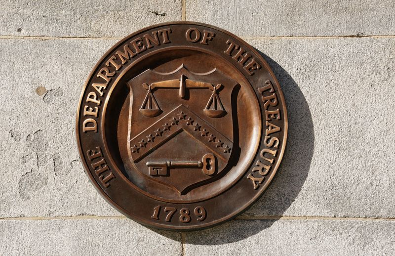 A bronze seal for the Department of the Treasury is shown at the U.S. Treasury building in Washington, U.S., January 20, 2023.  REUTERS/Kevin Lamarque