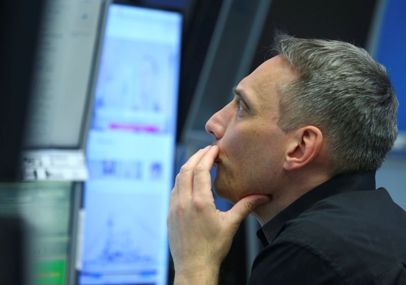 A trader works at Frankfurt's stock exchange in Frankfurt, Germany March 14, 2019. REUTERS/Ralph Orlowski