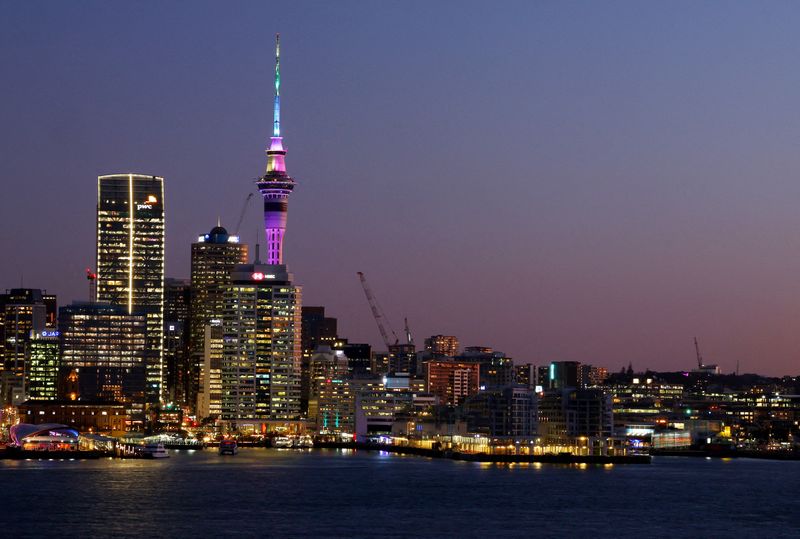 FILE PHOTO: General view of the Auckland skyline at sunset. Auckland, New Zealand - August 3, 2023 REUTERS/Molly Darlington/File Photo