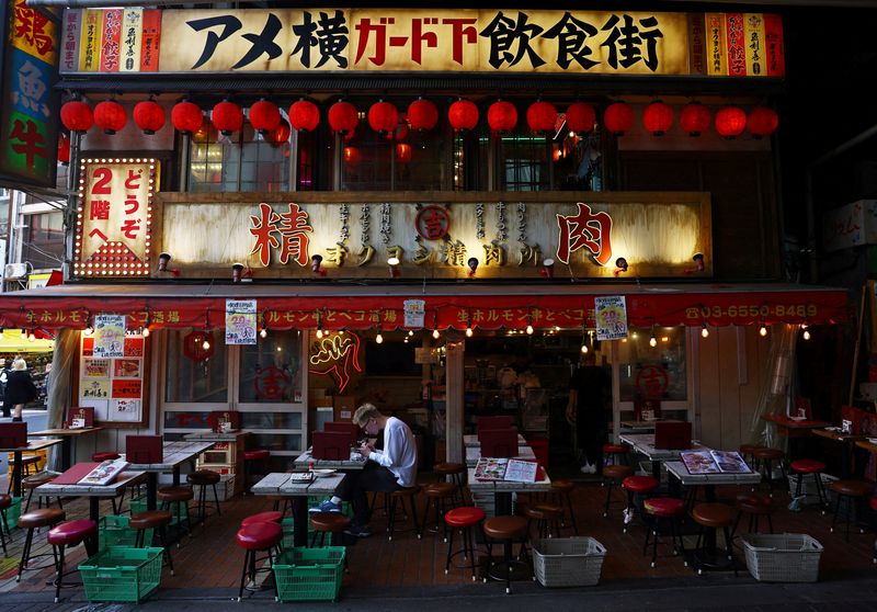 A man takes a lunch at a restaurant in the Ameyoko shopping district in Tokyo, Japan, May 15, 2025.  REUTERS/Issei Kato