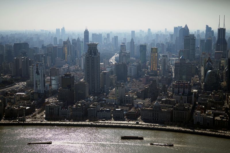 A view of the city skyline and Huangpu rive in Shanghai, China February 24, 2022. Picture taken February 24, 2022. REUTERS/Aly Song