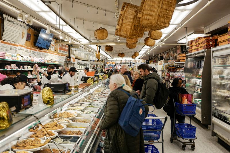 People shop at Zabar's supermarket in New York City, U.S., November 26, 2025. REUTERS/Jeenah Moon/File Photo
