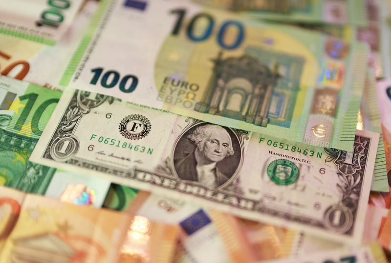 U.S. dollar and Euro banknotes are seen in this illustration taken March 24, 2026. REUTERS/Dado Ruvic/Illustration