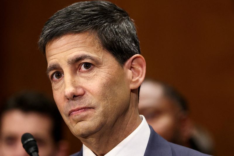 FILE PHOTO: Kevin Warsh, U.S. President Donald Trump's nominee to be next chair of the Federal Reserve, testifies before a Senate Banking Committee confirmation hearing on Capitol Hill in Washington, D.C., U.S., April 21, 2026. REUTERS/Kevin Lamarque/File Photo