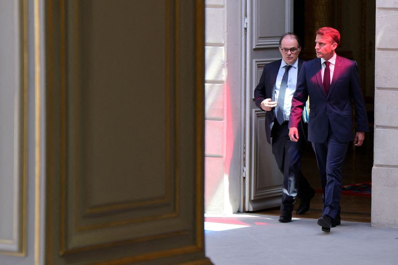 FILE PHOTO: Secretary General of the French Presidency Emmanuel Moulin walks with France's President Emmanuel Macron as they attend a summit on New Caledonia at the Elysee Palace in Paris on July 2, 2025. LUDOVIC MARIN/Pool via REUTERS/File Photo