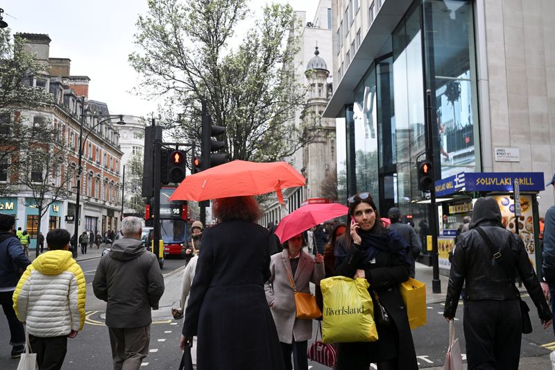People walk on Oxford Street in London, Britain, March 27, 2026. REUTERS/Jaimi Joy/File Photo