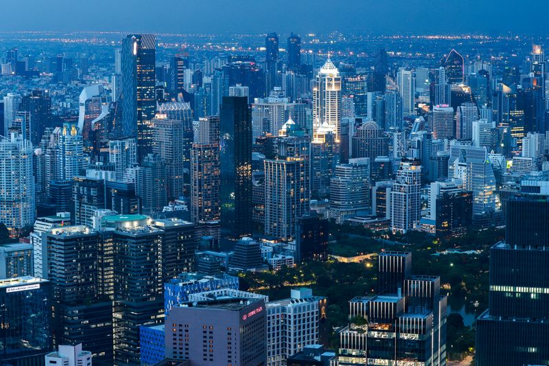 The skyline with twilight is photographed during sunset in Bangkok, Thailand, May 15, 2025. REUTERS/Athit Perawongmetha