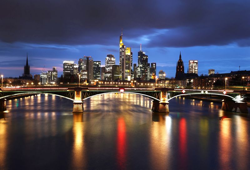 Dark clouds hang over the financial district in Frankfurt, Germany, March 16, 2021.  REUTERS/Kai Pfaffenbach