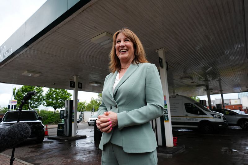 Chancellor of the Exchequer Rachel Reeves during a visit to a petrol station, as a planned increase in fuel duty has been scrapped to help motorists, in Leeds, Britain, May 20, 2026. Jacob King/Pool via REUTERS