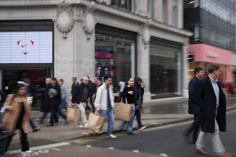 People walk on Oxford Street in London, Britain, March 27, 2026. REUTERS/Jaimi Joy