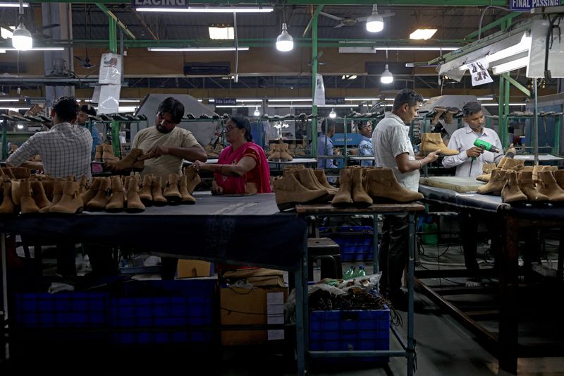 Workers make shoes inside a leather factory of Superhouse Group in Kanpur, India, May 12, 2026. REUTERS/Bhawika Chhabra
