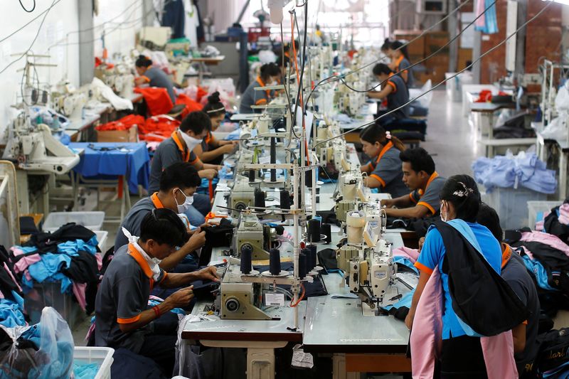 Labourers work at a garment factory in Bangkok, Thailand, May 30, 2016. Picture taken May 30, 2016. REUTERS/Athit Perawongmetha