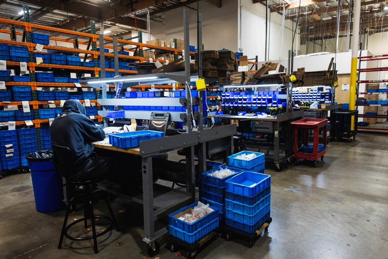 A worker makes locks at the Pacific Lock factory, which used to be located in Rye Canyon and is now located in a nearby business location, in Valencia, California, U.S. December 23, 2025.  REUTERS/Aude Guerrucci