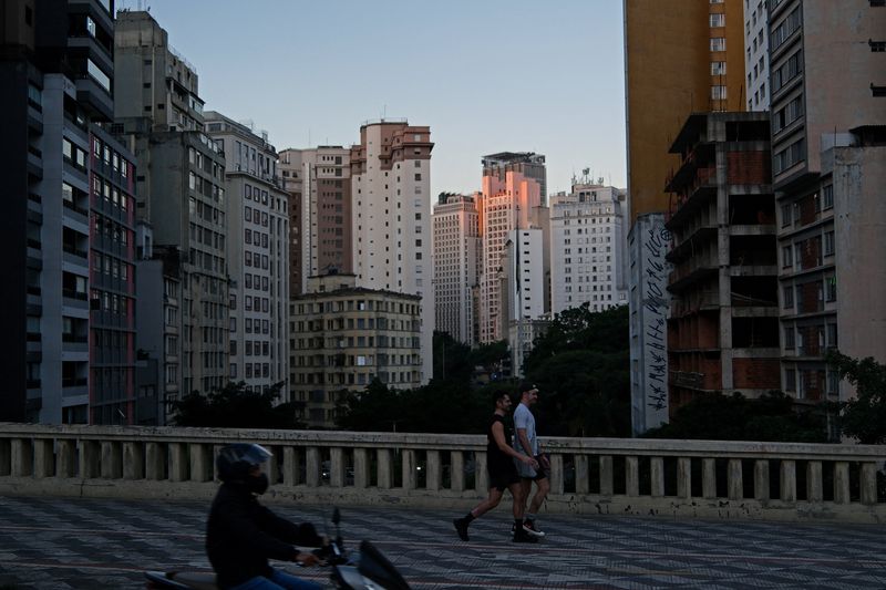 People walk along a street in downtown Sao Paulo, Brazil, May 6, 2026. REUTERS/Amanda Perobelli/File Photo