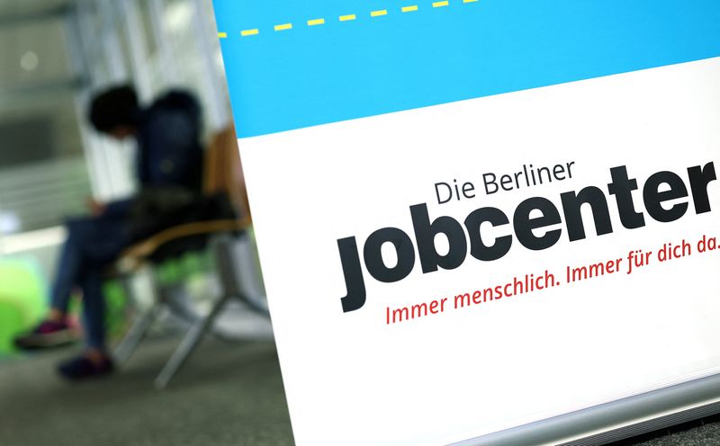 A person waits inside a jobcenter in Berlin, Germany, October 14, 2025. REUTERS/Lisi Niesner