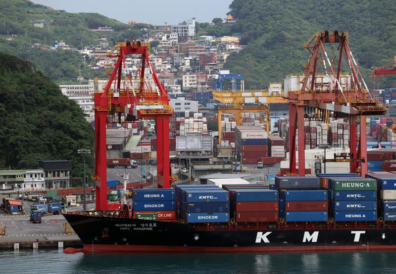 FILE PHOTO: A container ship is docked at Keelung Port in Keelung, Taiwan April 19, 2026.  REUTERS/Edgar Su/File Photo
