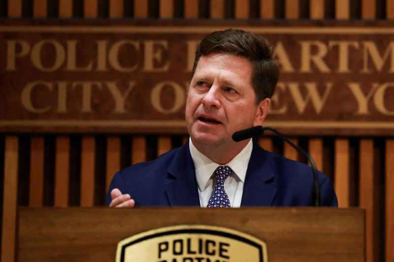 FILE PHOTO: Jay Clayton, U.S. Attorney for the Southern District of New York speaks during a press conference at the New York Police Department headquarters following the arrest of suspects charged with igniting IEDs near Gracie Mansion, the home of New York City Mayor Zohran Mamdani, in New York City, U.S., March 9, 2026. REUTERS/Brendan McDermid/File Photo