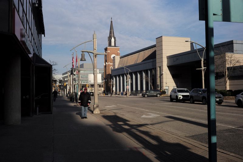 People walk at the downtown bus station in Windsor, Ontario, Canada, March 19, 2026. REUTERS/Wa Lone