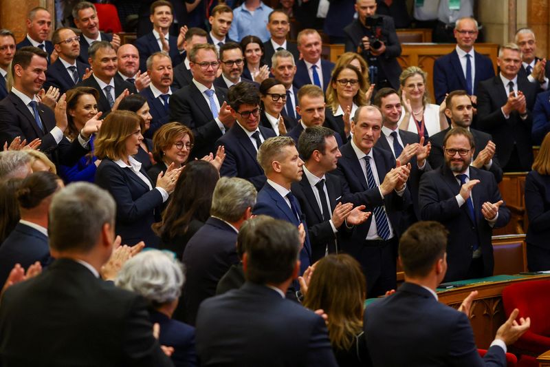 Peter Magyar receives a standing ovation as he becomes Hungary's new Prime Minister, at the Parliament in Budapest, Hungary, May 9, 2026. REUTERS/Bernadett Szabo
