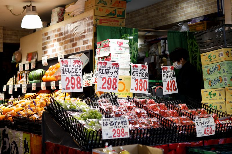 A view of a vegetable stand with prices at a supermarket in Tokyo, Japan, March 24, 2023. REUTERS/Androniki Christodoulou