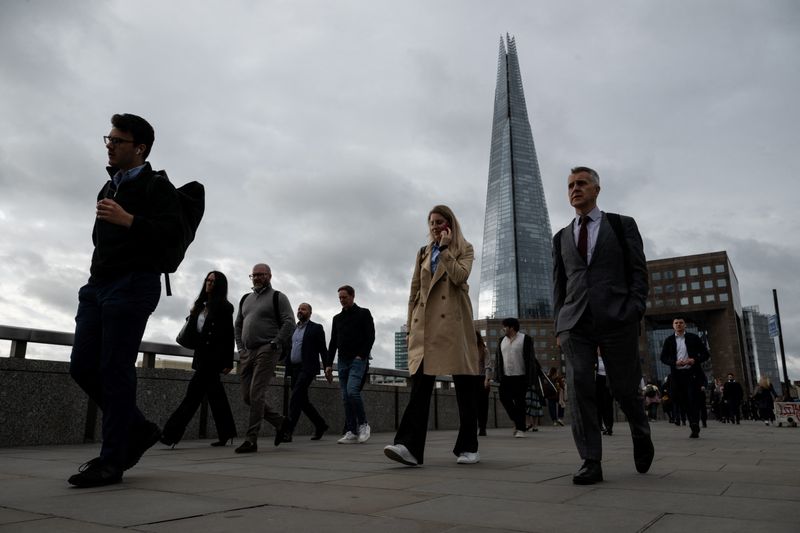 City workers walk over London Bridge during the morning rush hour in London, Britain, June 8, 2026. REUTERS/Chris J. Ratcliffe