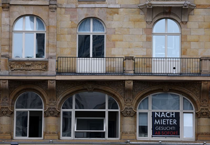 A sign reads "new tenant wanted" in a window of a commercial building in Frankfurt, Germany, July 19, 2023. Germany's property sector is in stress, underscoring a major change of fortune for real estate in Europe's largest economy after an end to the era of cheap money. REUTERS/Kai Pfaffenbach