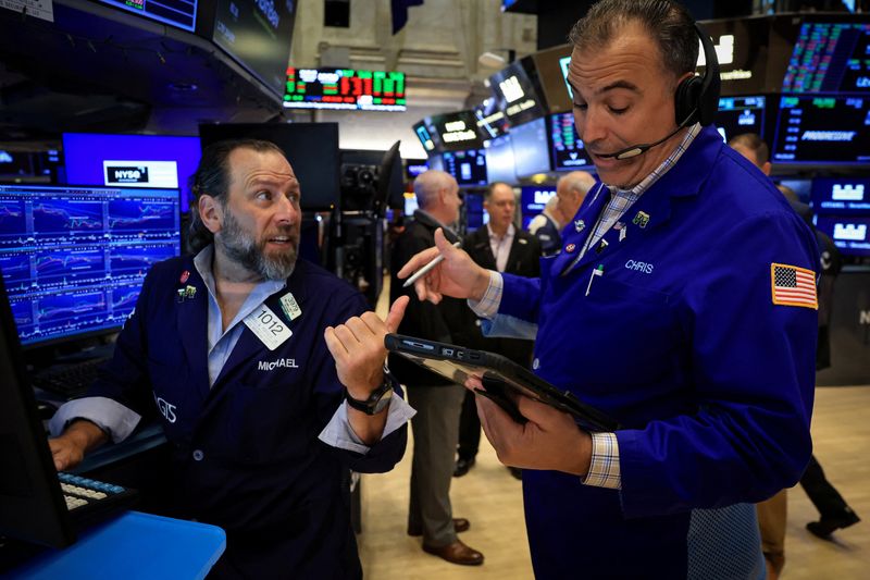 Traders work on the floor at the New York Stock Exchange (NYSE) in New York City, U.S., June 24, 2026.  REUTERS/Brendan McDermid
