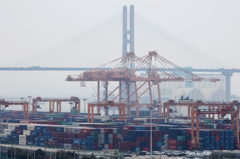 Cranes and shipping containers are seen at Pyeongtaek port in Pyeongtaek, South Korea, April 2, 2025.   REUTERS/Kim Hong-Ji