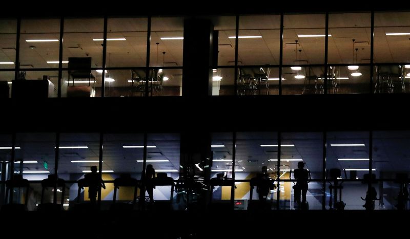 People exercise inside an office building, in Buenos Aires, Argentina August 9, 2022. REUTERS/Agustin Marcarian