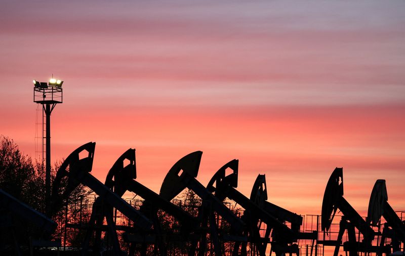 Sunset clouds glow over pump jacks at the Airankol oil field operated by Caspiy Neft in the Atyrau region, Kazakhstan, April 21, 2026. REUTERS/Pavel Mikheyev