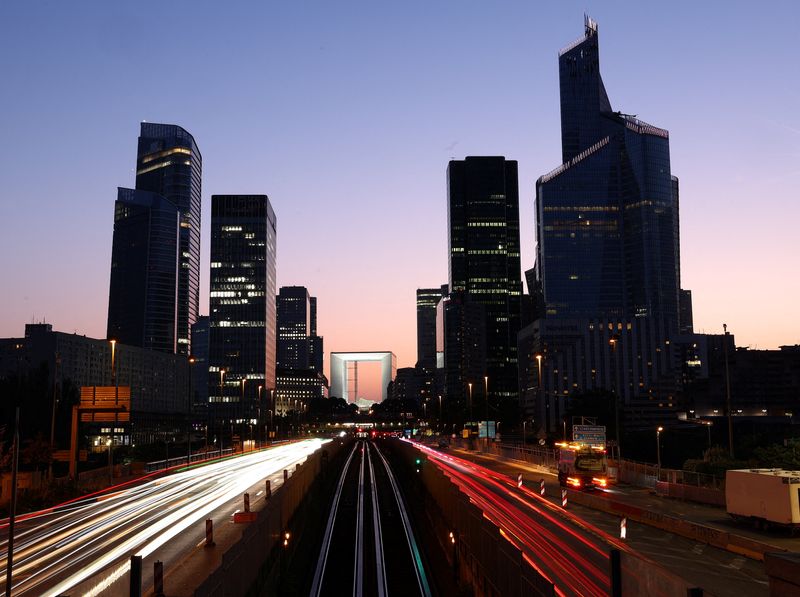 A view shows the financial and business district of La Defense in Puteaux near Paris, June 23, 2026. Picture taken with a long exposure. REUTERS/Abdul Saboor