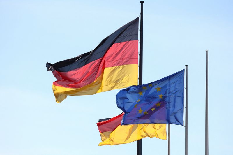 The flags of Germany and the European Union flutter on the day of a session of the lower house of the German parliament, the Bundestag, in Berlin, Germany, May 21, 2025. REUTERS/Liesa Johannssen