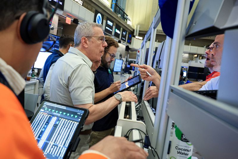 Futures-options traders work on the floor at the New York Stock Exchange's NYSE American (AMEX) in New York City, U.S. June 22, 2026.  REUTERS/Brendan McDermid