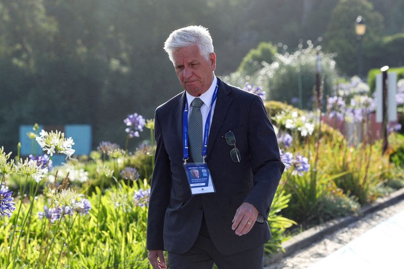 FILE PHOTO: Christopher J. Waller, member of the Board of Governors of the Federal Reserve System, enters for the morning session at the ECB Forum, in Sintra, Portugal June 30, 2026. REUTERS/Pedro Rocha/File Photo
