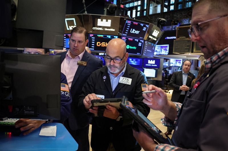 Traders work on the floor at the New York Stock Exchange (NYSE) in New York City, U.S., July 23, 2026.  REUTERS/Brendan McDermid