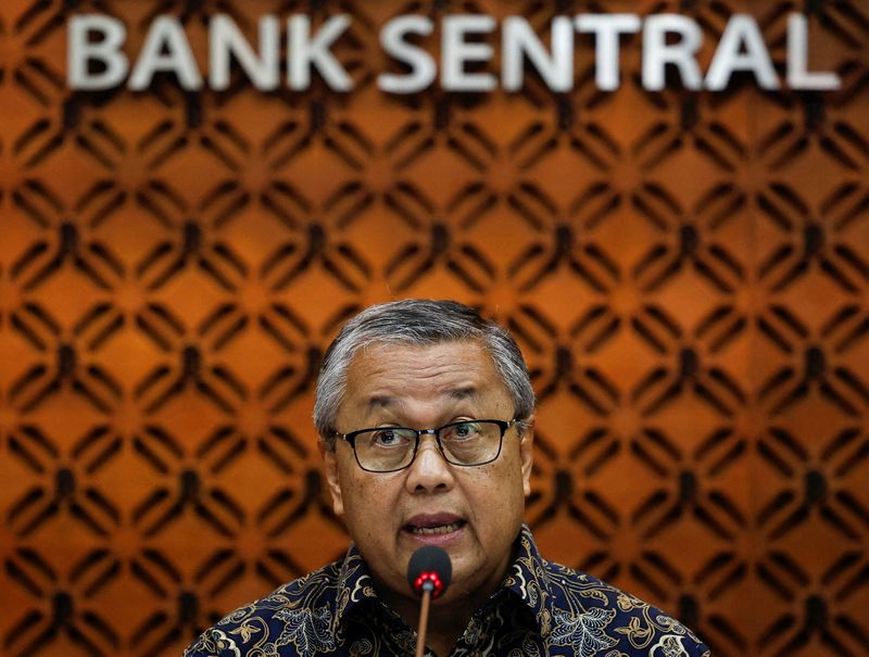 FILE PHOTO: Indonesia's Central Bank Governor Perry Warjiyo speaks during a press conference at Bank Indonesia's headquarters in Jakarta, Indonesia, January 15, 2025. REUTERS/Willy Kurniawan/File Photo