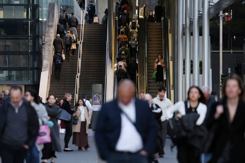 Commuters ride the escalators at Barangaroo in Sydney, Australia, July 23, 2026. REUTERS/Hollie Adams