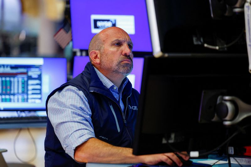 A trader works on the floor of the New York Stock Exchange (NYSE) in New York City, U.S., August 3, 2026. REUTERS/Jeenah Moon