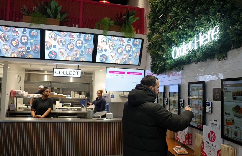 A customer uses an electronic ordering station at a K10 Japanese restaurant in London, Britain, January 16, 2026. REUTERS/Toby Melville