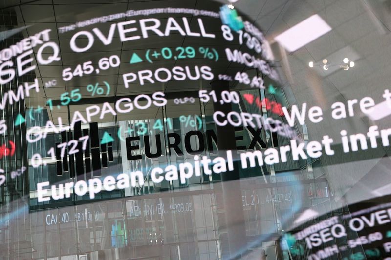 The reflection of a digital board showing trading data at the Euronext stock exchange in the La Defense business district in Paris, France, March 10, 2025. REUTERS/Benoit Tessier